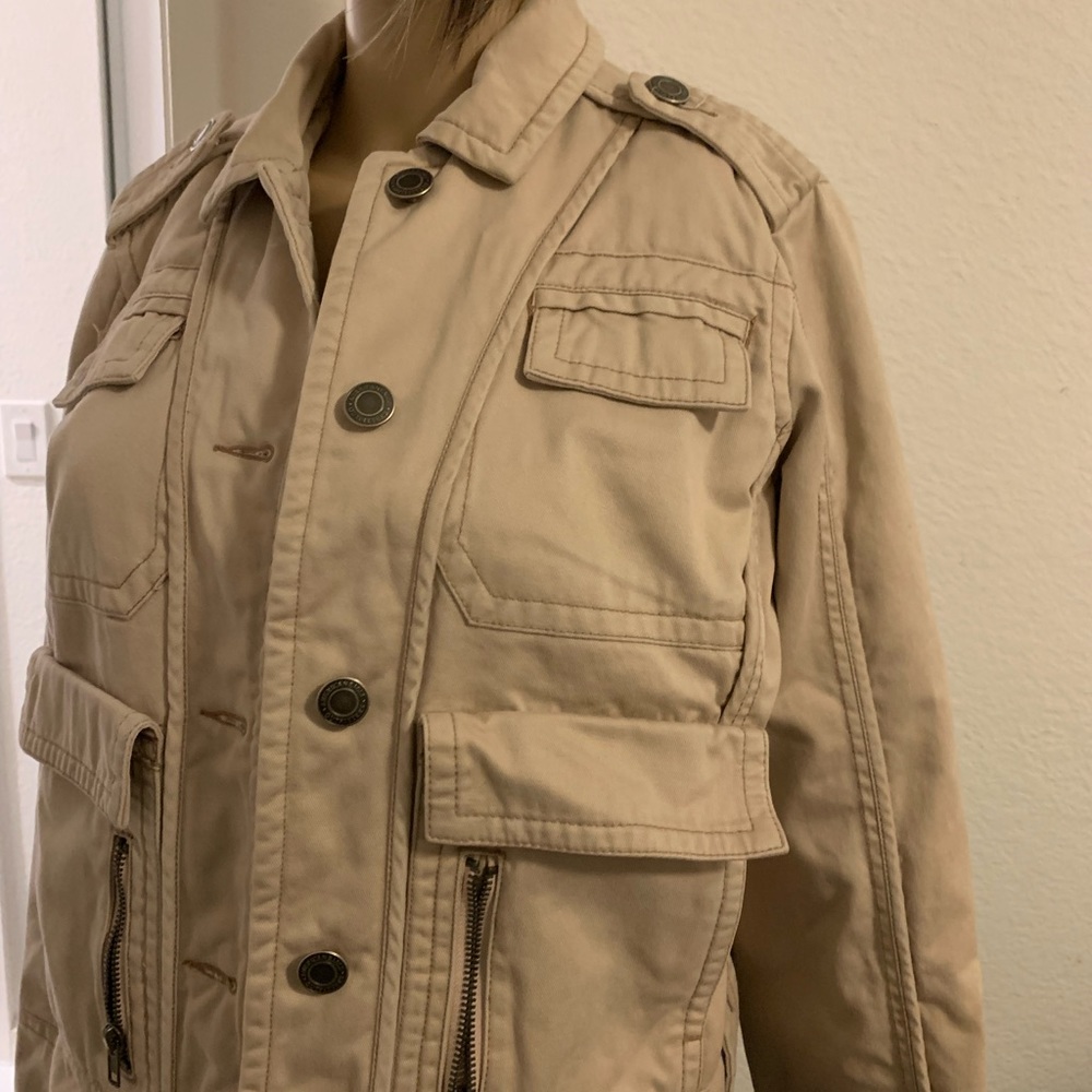 (American Eagle) outfitters unisex jacket (smiley face) covered the small hole
